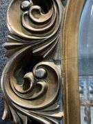 Ornately Carved Gilt Wall Mirror with Arched Design