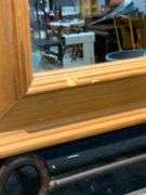 Wood-Framed Mirror with Metal Scrollwork Corners