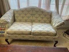 Upholstered Loveseat with Floral Pattern and Wood Legs