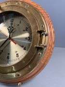Quartz Wall Clock With Brass Porthole-Style Frame and Wood Backing