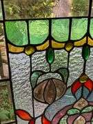 Stained Glass Panel With Floral and Geometric Design