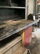 Industrial-Style Workbench with Storage Drawers and Shelving