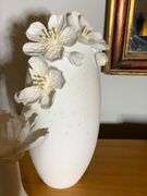 Three White Ceramic Vases with Applied Floral Detailing