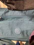 Four Kipling Nylon Shoulder Bags with Monkey Keychains