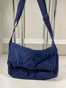 Four Kipling Nylon Shoulder Bags with Monkey Keychains