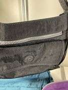 Four Kipling Nylon Shoulder Bags with Monkey Keychains