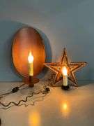 Two Decorative Electric Candle Lamps with Star and Oval Designs