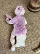 Four Chalkware Figurines Including Boy, Girl, and Two Reclining Cherubs