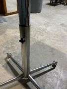 Adjustable Swivel Table with Wood Top and Chrome Base on Casters
