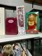 Boxed and Unboxed Porcelain and Vinyl Dolls From Various Makers