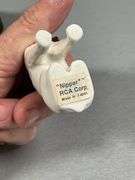 RCA ‘Nipper’ Figurines Including Coin Bank, Miniature Figurine, and Trinket Box