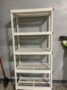 White Plastic Tiered Shelving Unit With Black Accents