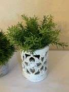 Four Small Artificial Plants in Decorative Pots