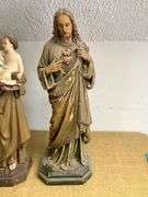 Four Religious Figurines Featuring Virgin Mary, Jesus, and Saints