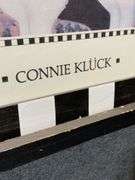 Framed Artwork by Connie Kluck with Black and White Checkerboard Border