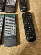 8 Assorted Remote Controls Including Sony, Dish Network, and Others