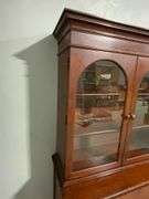 Two-Piece Wooden Hutch with Arched Glass Doors and Storage