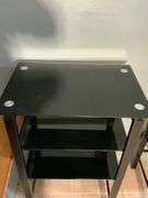 Black Tiered Glass and Metal Shelving Unit