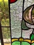 Stained Glass Panel With Floral and Geometric Design