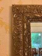 Gold-Tone Framed Wall Mirror with Ornate Detailing
