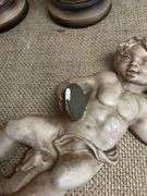 Four Chalkware Figurines Including Boy, Girl, and Two Reclining Cherubs