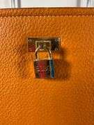 BCBG Camel Beige Tote with Lock Charm and Tag