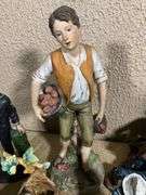 Figurines Featuring Various Themes and Makers