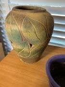 Three Decorative Pottery Planters With Carved Designs