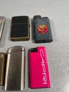 Eight Cigarette Lighters Including Zippo, Marlboro and Capri