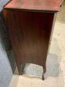Larkin 1920s Mahogany-Finished Wooden Music Cabinet with Curved Legs and Single Door