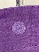 Four Kipling Nylon Shoulder Bags with Monkey Keychains