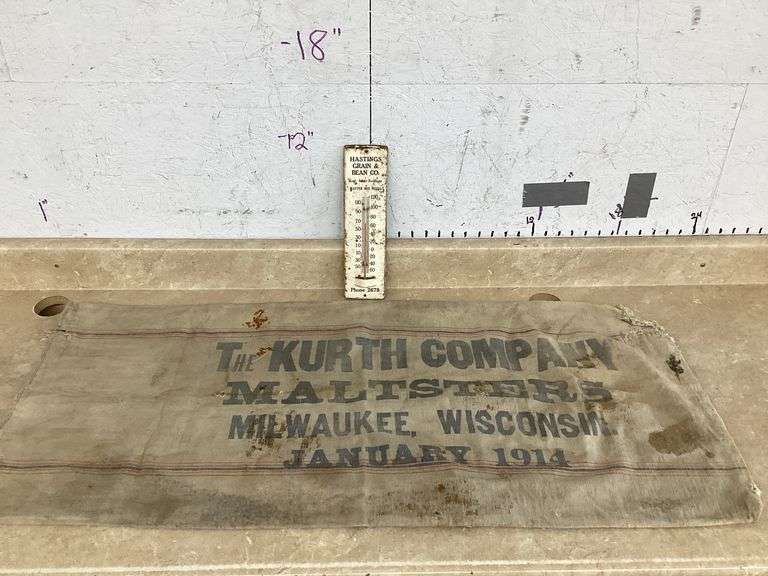 VINTAGE THERMOMETER AND OLD GRAIN BAG