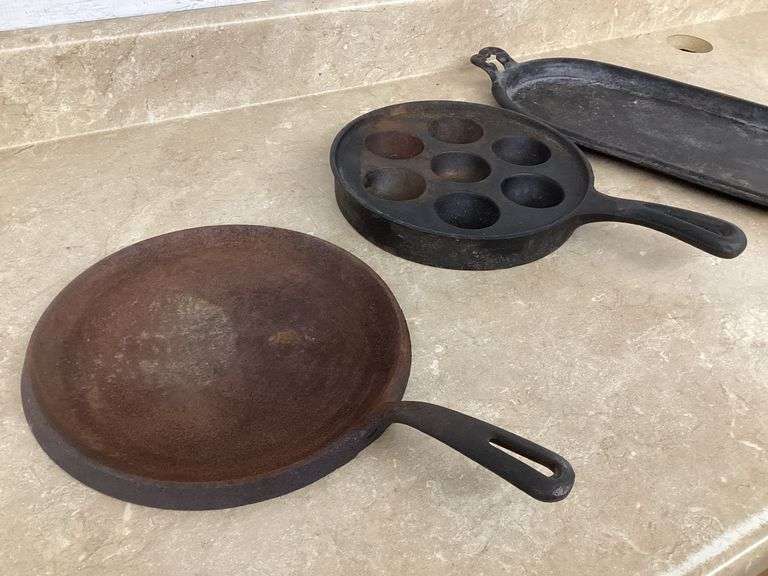 CAST-IRON PLATTER, BUSCUIT PAN AND GRIDDLE
