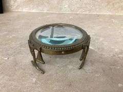 VINTAGE MAGNIFYING GLASS WITH BRASS LEGS