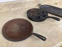 CAST-IRON PLATTER, BUSCUIT PAN AND GRIDDLE