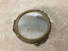 VINTAGE MAGNIFYING GLASS WITH BRASS LEGS