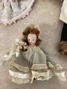 ANTIQUE PORCELAIN DOLL AND OTHER VINTAGE DOLLS