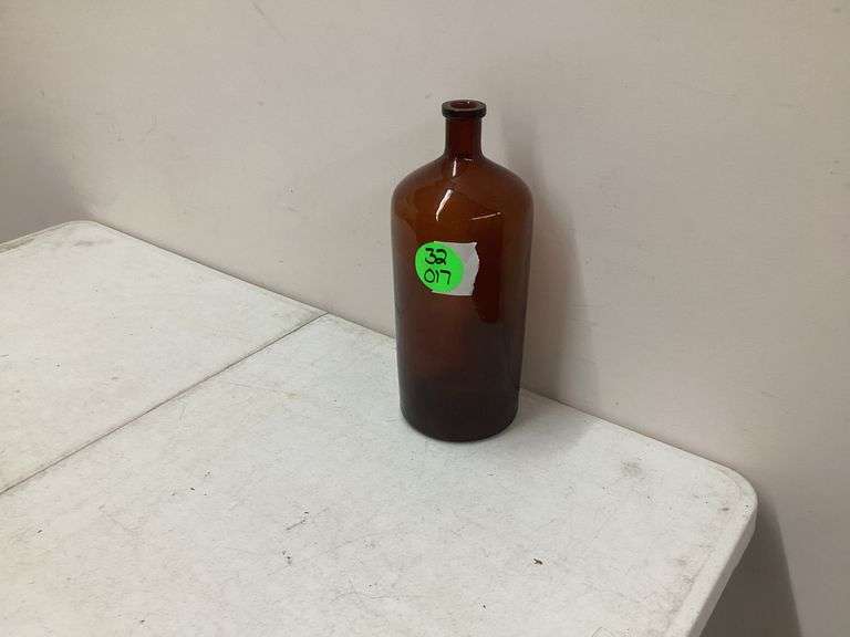 LARGE BROWN GLASS BOTTLE
