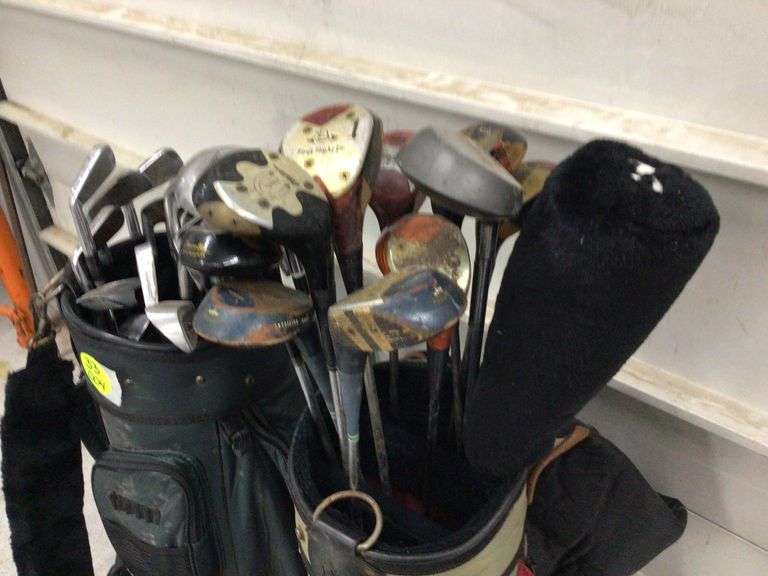 ASSORTED GOLF CLUBS AND 2 GOLF BAGS