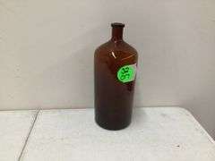 LARGE BROWN GLASS BOTTLE