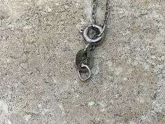 STERLING SILVER CHAIN AND CHARM