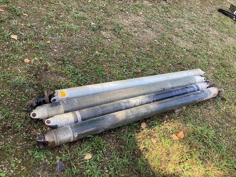 3 FIBERGLASS AND 1 ALUMINUM CHEVY DRIVE SHAFTS