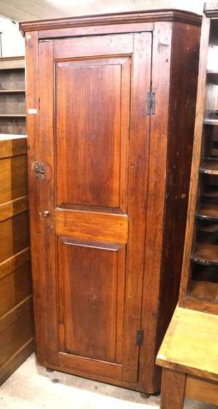 Diminutive Pennsylvania Pine Raised Panel Corner Cupboard