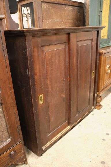 Antique Raised Panel Sliding Door Bookcase