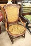 Victorian Carved Walnut Caned Rocker