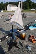 *NO STORAGE* 1566 Ship Weathervane, Propane Cooker and Pot, Flower Pots, Etc.