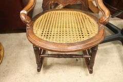 Victorian Carved Walnut Caned Rocker
