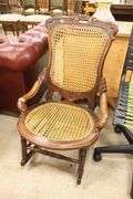 Victorian Carved Walnut Caned Rocker