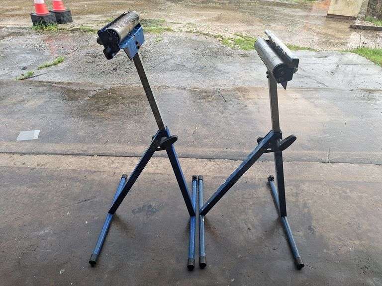 Two blue metal rolling stands both one money