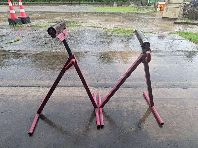 Two metal rolling stands (red)both one money